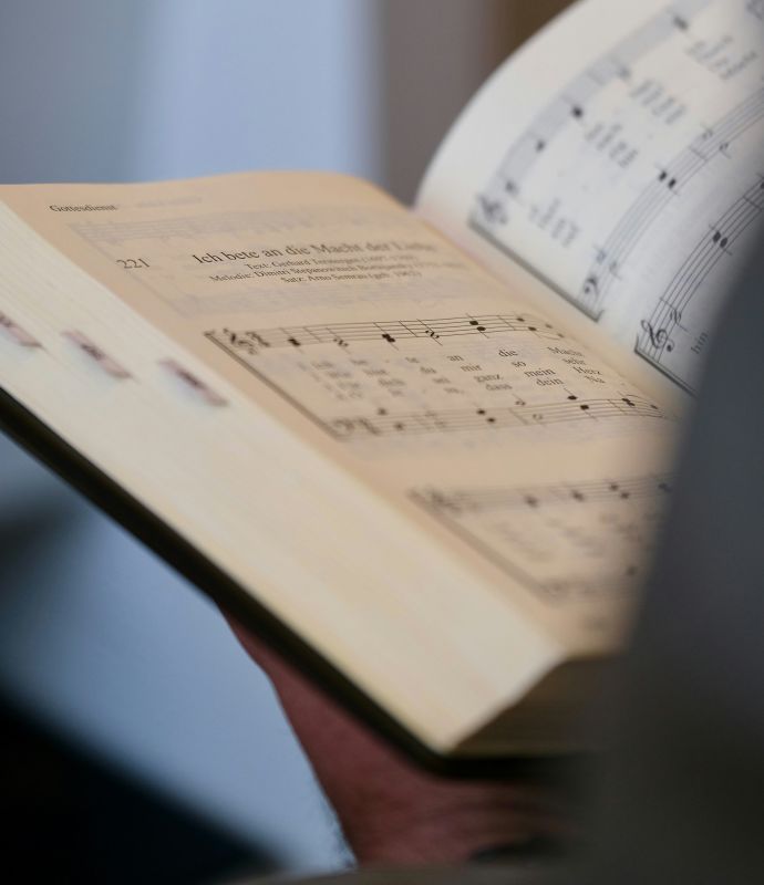 green hymnal manuel luikenga FWpBXKOy6qo unsplash.jpg crop resize